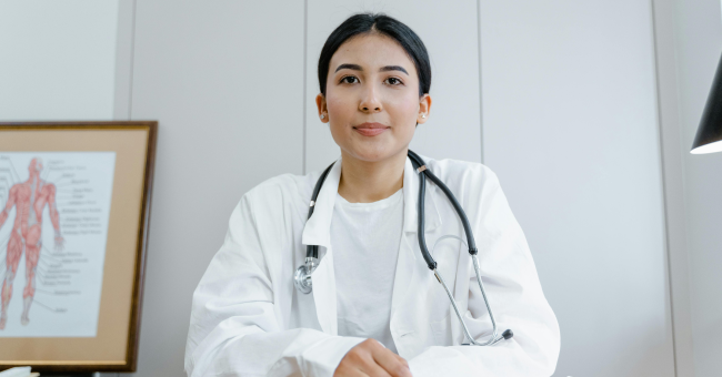 Doctor consulting with a corporate employee for a healthier work environment